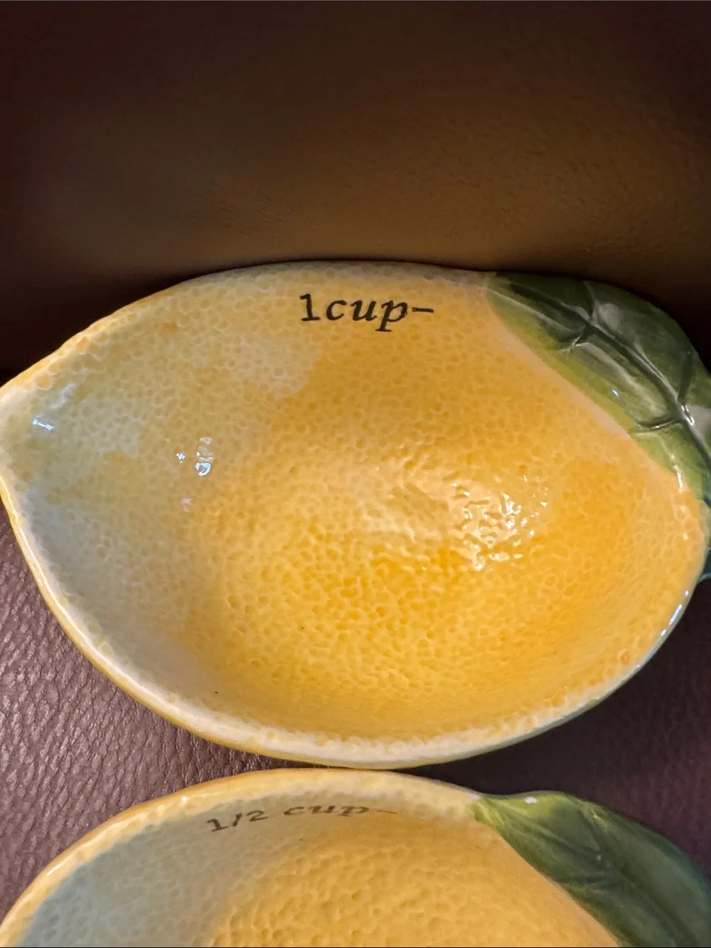 Lemon shaped nesting measuring cups